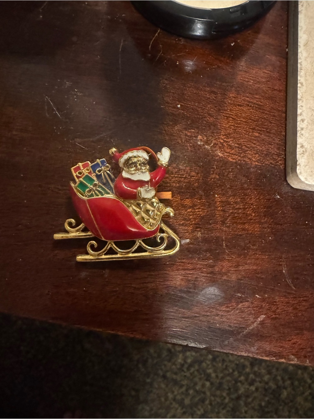 Gold-Tone Red Santa Sleigh Brooch with Gift Accents